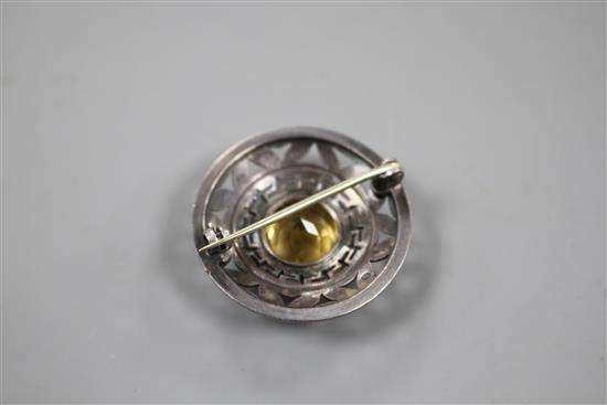A 1960s Sybil Dunlop pierced parcel gilt silver and citrine set target brooch, London, 1965, 32mm, gross 9.1 grams.